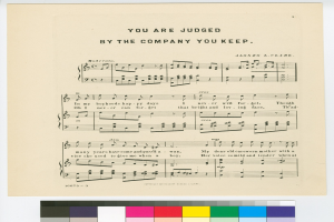 Notenblatt mit der Überschrift "Du wirst nach deiner Gesellschaft beurteilt" und Farbproben unten.