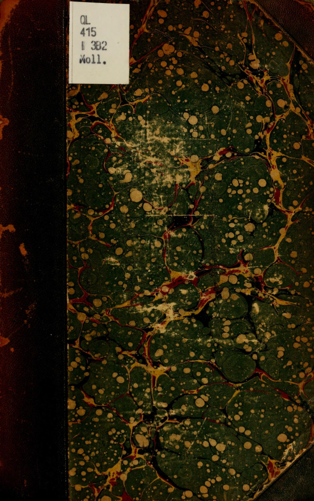 Nahaufnahme eines Hardcover-Buchs mit glänzendem Einband und einem Textaufkleber auf dem Cover.