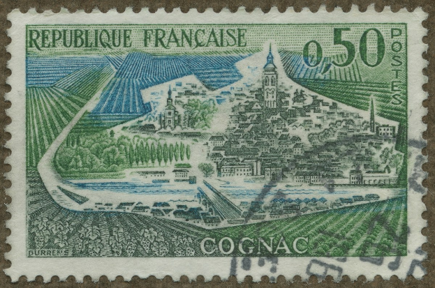 Ein Stempel mit einer Stadtansicht mit Gebäuden, Bäumen und Text.