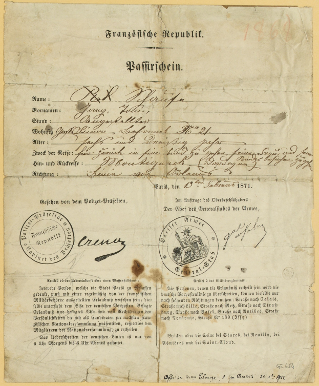 Altes deutsches Regierungsdokument mit rundem schwarzumrandetem Stempel auf vergilbtem Papier, das schwarze Schrift enthält.