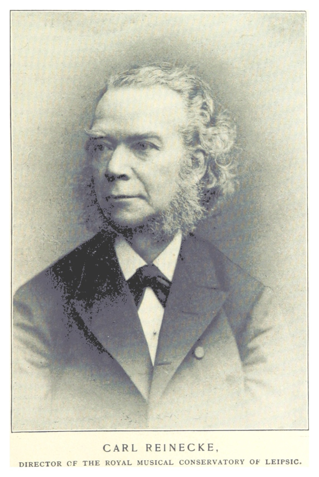 Schwarz-weiß-Portr├Ąt von Carl Reinecke, Direktor des K├äiglichen Musikalischen Konservatoriums Leipzig, in einem Anzug mit Text unten.